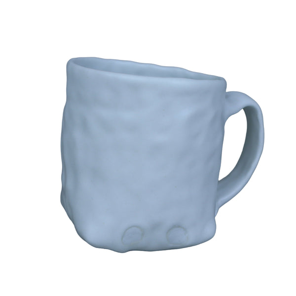 White textured mug on a black background