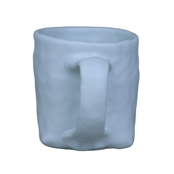Hand built porcelain cup with folded base
