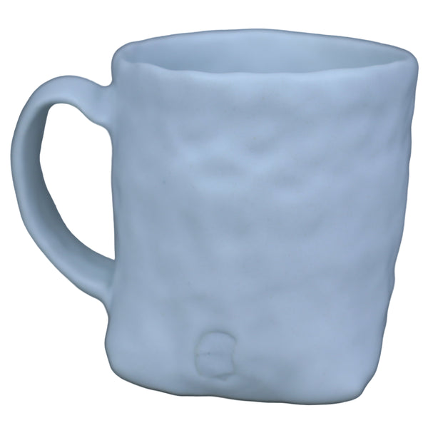 Hand built porcelain cup with folded base