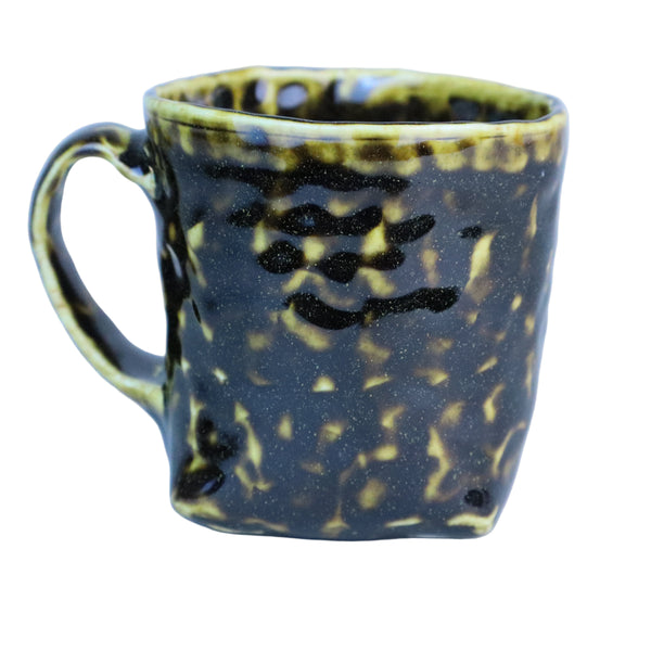 Hand built porcelain cup with folded base (brown)