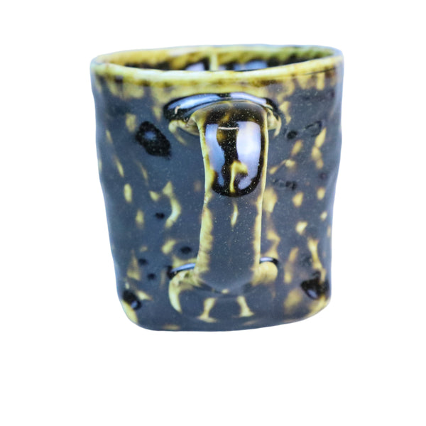 Hand built porcelain cup with folded base (brown)