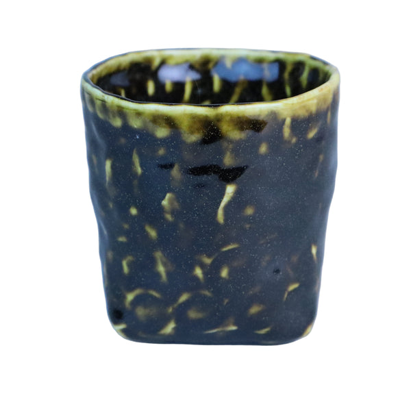 Hand built porcelain cup with folded base (brown)