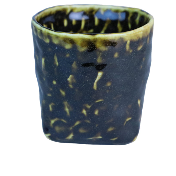 Hand built porcelain cup with folded base (brown)
