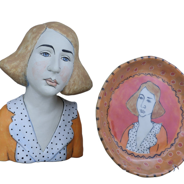 Head #4 and accompanying plate with stand