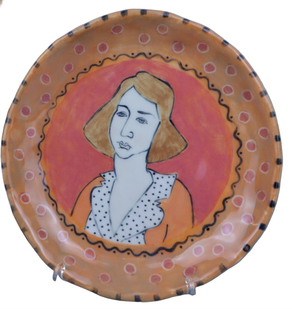 Head #4 and accompanying plate with stand