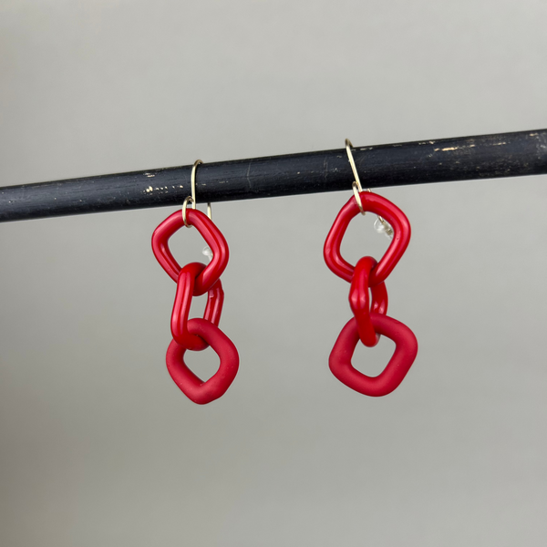 Handmade red glass chain earrings by Minori Takagi with 14K gold fill hooks, 2 inches long, lightweight and sculptural design.