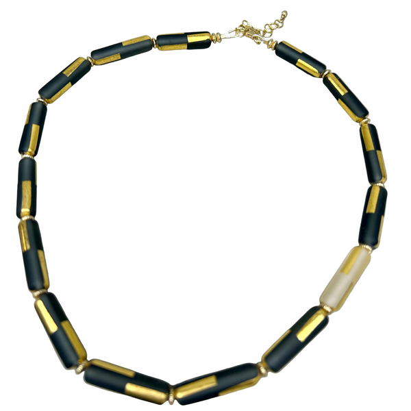 Black sandblasted glass necklace by Minori Takagi with 24K gold leaf detail and 14K gold filled chain, 18 inches long.