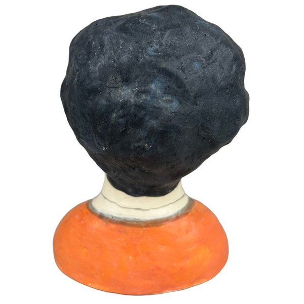 Sculpted head and accompanying plate with stand