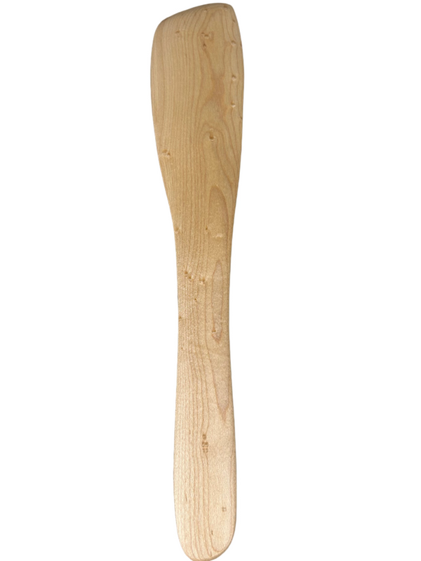 Wooden spatula on a gray background