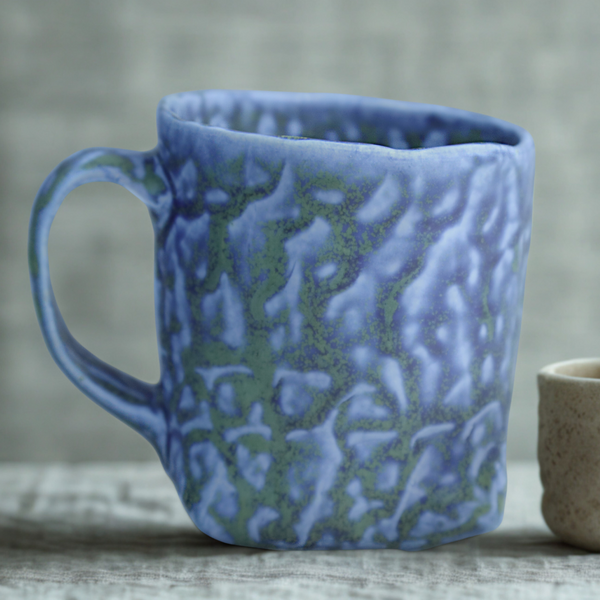Hand built porcelain cup with folded base (blue)