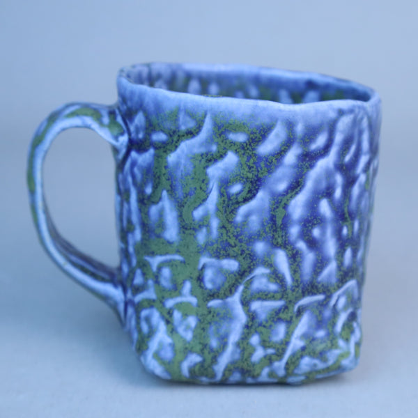 Hand built porcelain cup with folded base (blue)