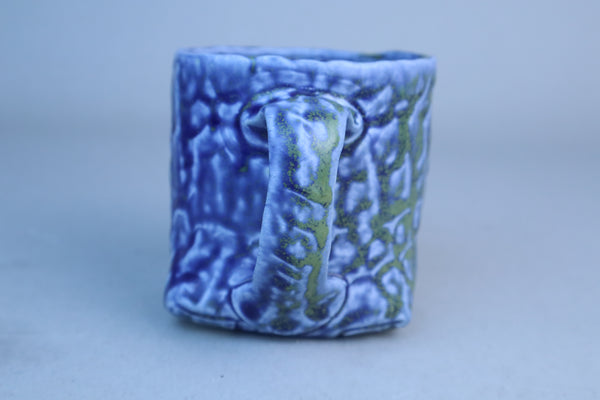 Hand built porcelain cup with folded base (blue)