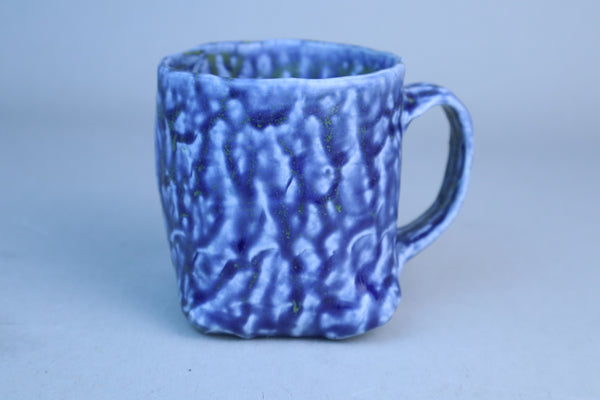 Hand built porcelain cup with folded base (blue)