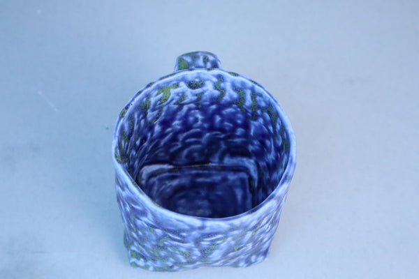 Hand built porcelain cup with folded base (blue)