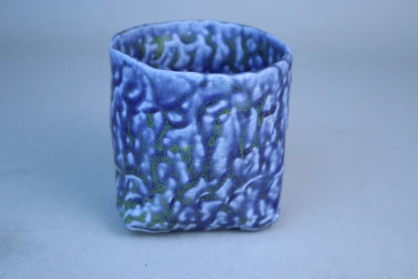 Hand built porcelain cup with folded base (blue)