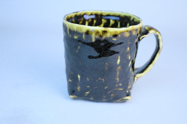 Hand built porcelain cup with folded base (brown)