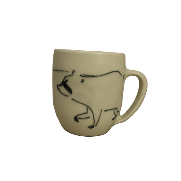 White mug with black line drawing of a Racoon 