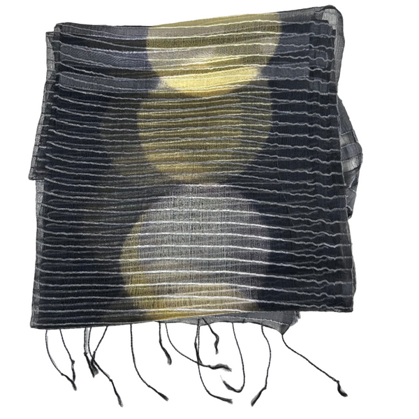 Black and yellow patterned scarf on a white background