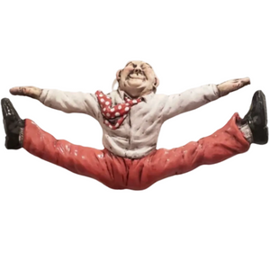 Figurine of a person in a split pose with a white background