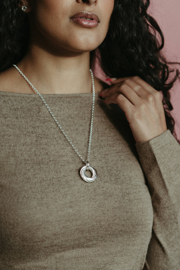 Infinity Knot Necklace in Sterling Silver | Walker Metalsmiths